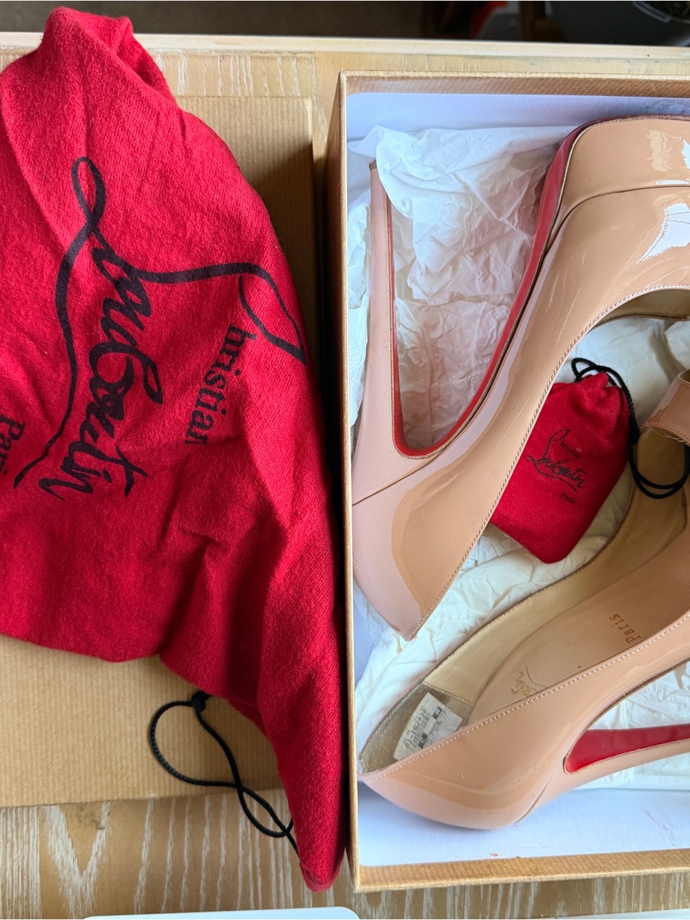 Christian Louboutin Nude Patent Pumps with Red Sole